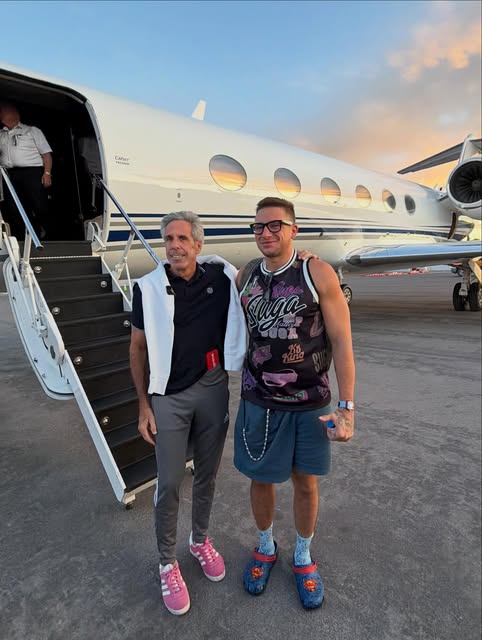Steve in front of a private jet