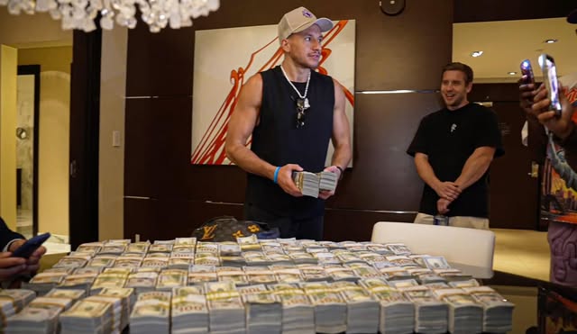 Steve with a table of cash stacks